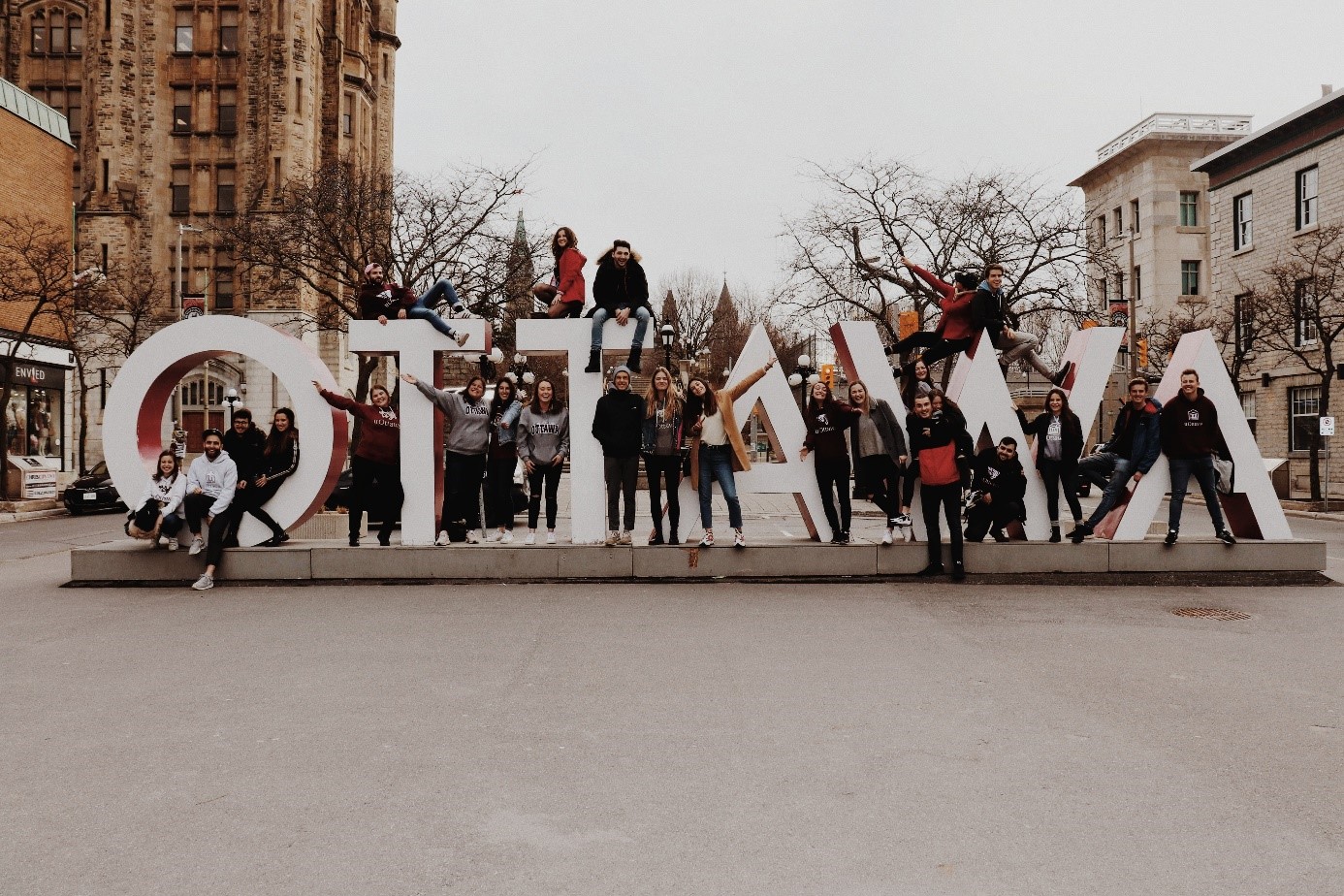 Group of Telfer students on the OTTAWA sign in the Byward Market